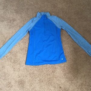 A women’s small Xersion sweater